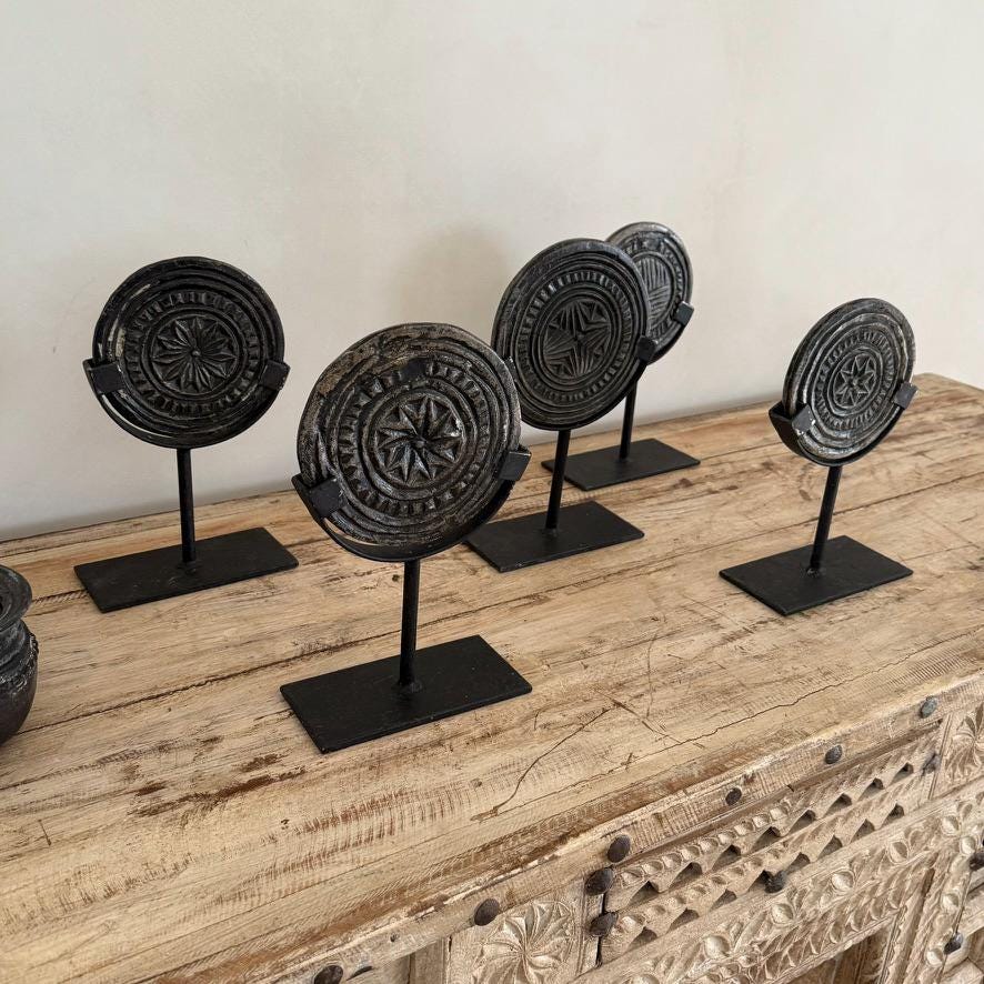 Antique Black Stone Biscuit Mold on Iron Stand