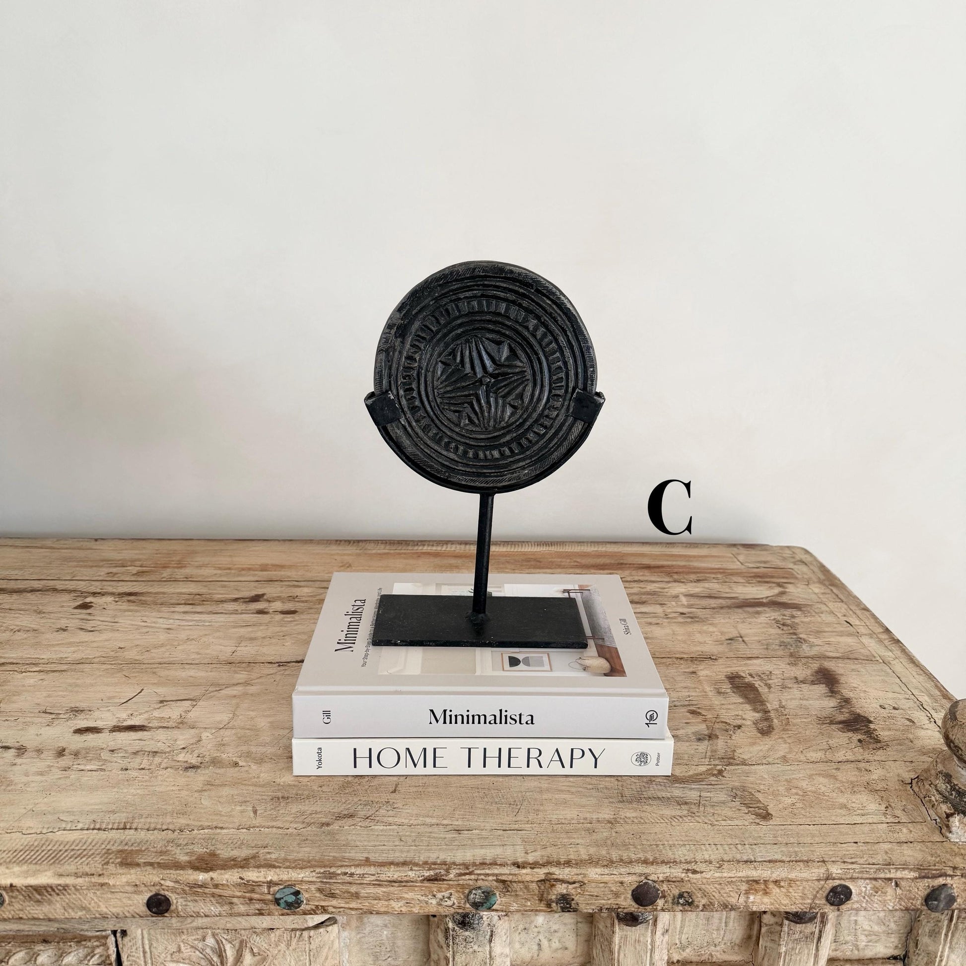 Antique Black Stone Biscuit Mold on Iron Stand