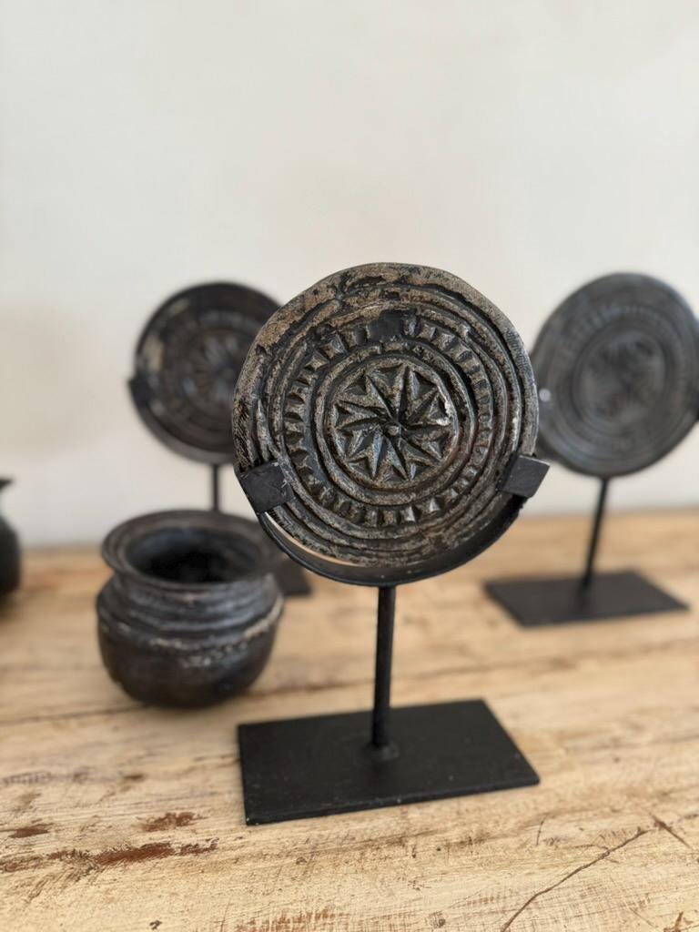 Antique Black Stone Biscuit Mold on Iron Stand