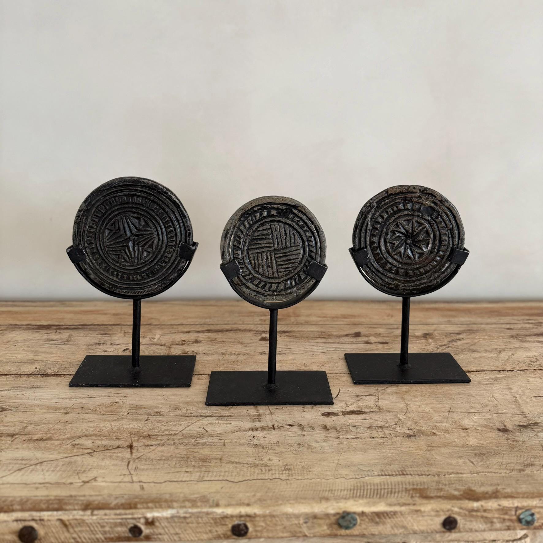 Antique Black Stone Biscuit Mold on Iron Stand